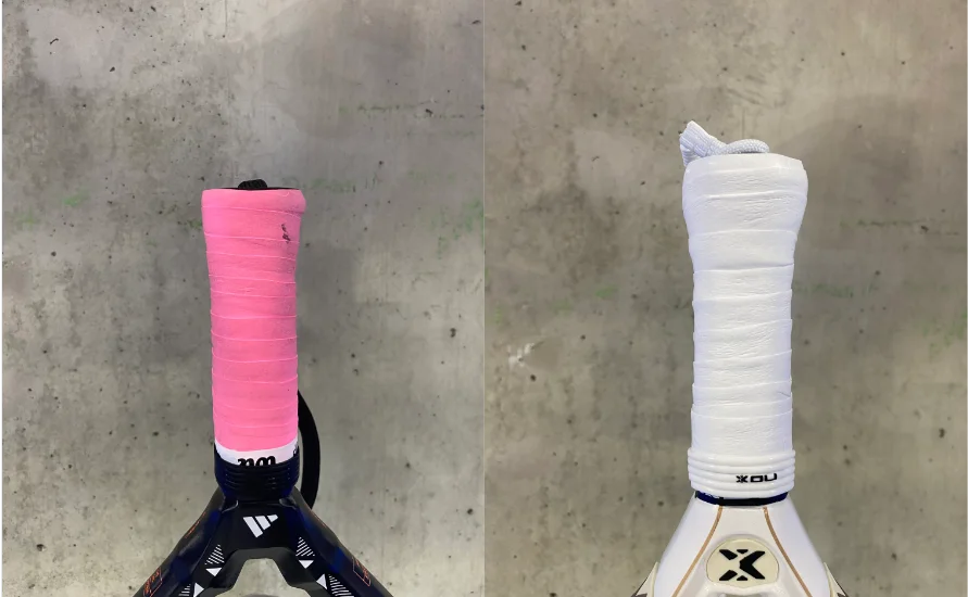 Zwei Padelschläger-Griffe im Vergleich: pinker Overgrip auf schwarzem Griff und weißer Overgrip auf weißem Griff